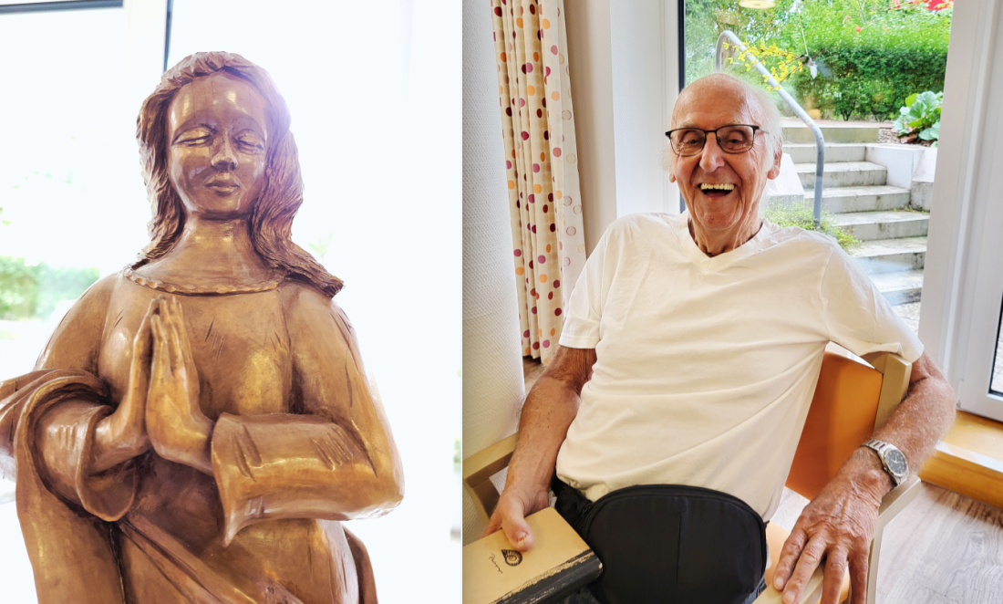 Hermann Heyen mit seiner Lieblingsskulptur, der nur ganz wenig lächelnden Madonna